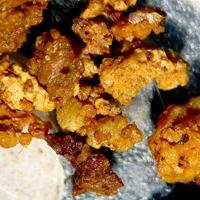 Cadwaladerite, Hydrokenoralstonite