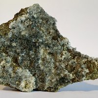 Takanelite, Calcite