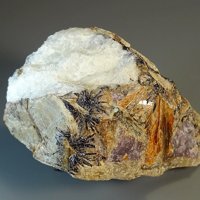 Umbozerite, Vuonnemite, Serandite