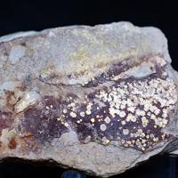 Calcurmolite, Umohoite