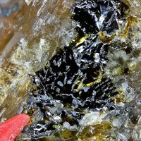 Nagelschmidtite, Andradite