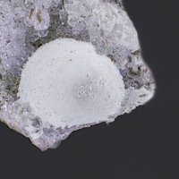Tacharanite