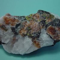 Panasqueiraite, Ferberite, Siderite