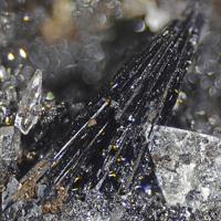 Cahnite, Groutite, Calcite
