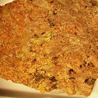 Umohoite, Calcurmolite