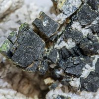 Ullmannite, Calcite