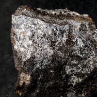 Ganomalite, Barysilite