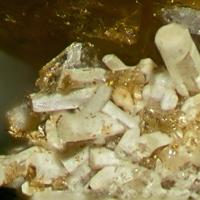 Calcioburbankite, Petersenite-(Ce)