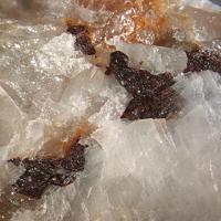 Gamagarite, Tinzenite