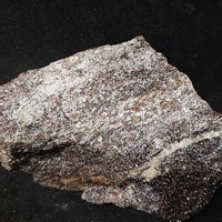 Ganomalite