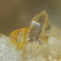 Gasparite-(Ce), Quartz