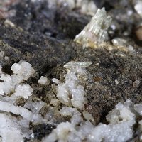 Gadolinite-(Ce), Monazite-(Ce), Adularia