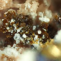 Earlshannonite, Krásnoite
