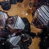 Jahnsite-(CaMnMg), Mitridatite