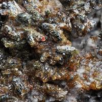 Badalovite, Hematite