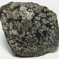 Ganomalite, Manganophyllite