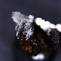 Pahasapaite, Roscherite, Tiptopite