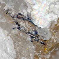 Baumhauerite, Calcite