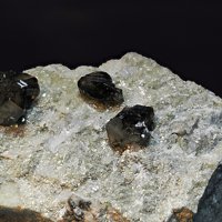 Cassiterite, Quartz