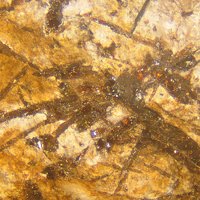 Umbozerite, Ussingite