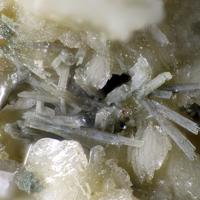 Carbocernaite