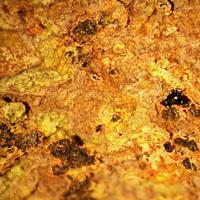 Umohoite, Calcurmolite