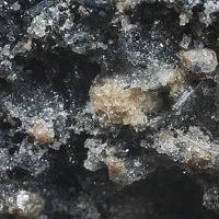 Calciohilairite, Kuzmenkoite-Mn
