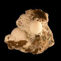 Tacharanite