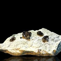Cassiterite, Quartz